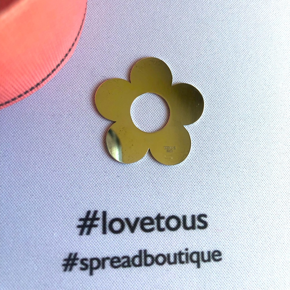 Tous hold charm